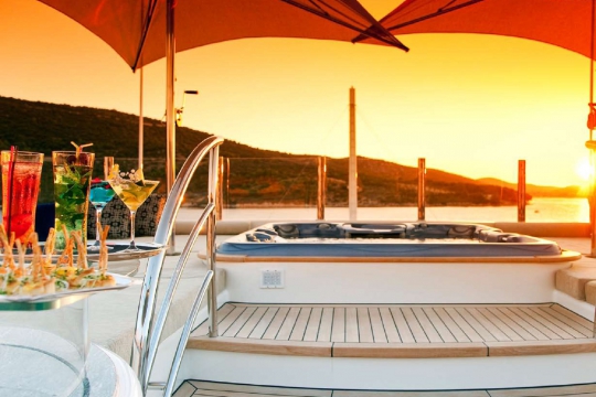 Motor Yacht Mary-Jean II Isa for charter - bridge deck jacuzzi sunset