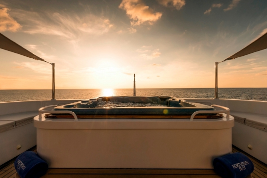 Motor Yacht Northern Sun for charter - sundeck jacuzzi sunset