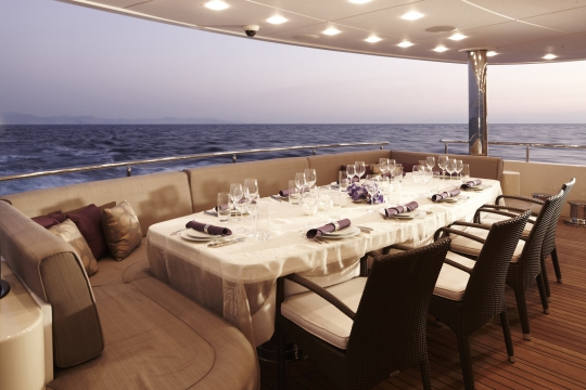 Motor Yacht E&E for charter - aft main deck dining table